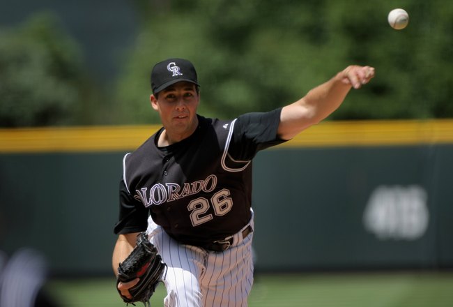 DENVER - MAY 24:  Starting pitcher Jeff Francis #26 of the Colorado Rockies delivers against the New York Mets in the first inning at Coors Field on May 24, 2008 in Denver, Colorado. Francis collected the loss as the Mets defeated the Rockies 9-2.  (Photo by Doug Pensinger/Getty Images)
