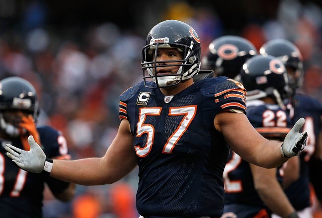 CHICAGO - DECEMBER 06: Olin Kreutz #57 of the Chicago Bears complains toa referee during a game against the St. Louis Rams at Soldier Field on December 6, 2009 in Chicago, Illinois. The Bears defeated the Rams 17-9. (Photo by Jonathan Daniel/Getty Images)