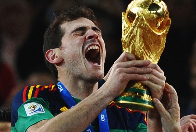 JOHANNESBURG, SOUTH AFRICA - JULY 11:  Iker Casillas, captain of Spain, celebrates victory with the World Cup trophy  during the 2010 FIFA World Cup South Africa Final match between Netherlands and Spain at Soccer City Stadium on July 11, 2010 in Johannesburg, South Africa.  (Photo by Laurence Griffiths/Getty Images)