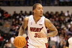 DALLAS - FEBRUARY 12:  Michael Beasley #30 of the Sophomore team brings the ball up court while playing against the Rookie team during the second half of the T-Mobile Rookie Challenge & Youth Jam part of 2010 NBA All-Star Weekend at American Airlines Center on February 12, 2010 in Dallas, Texas. NOTE TO USER: User expressly acknowledges and agrees that, by downloading and or using this photograph, User is consenting to the terms and conditions of the Getty Images License Agreement.  (Photo by Ronald Martinez/Getty Images)