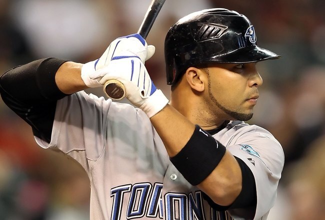 PHOENIX - MAY 22:  Alex Gonzalez #11 of the Toronto Blue Jays bats against the Arizona Diamondbacks during the Major League Baseball game at Chase Field on May 22, 2010 in Phoenix, Arizona. The Diamondbacks defeated the Blue Jays 8-5.  (Photo by Christian Petersen/Getty Images)