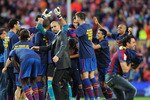 BARCELONA, SPAIN - MAY 16: Barcelona manager Josep Guardiola (C) celebrates with his team after they beat Real Valladolid 4-0 to clinch La Liga title after their match at Camp Nou stadium on May 16, 2010 in Barcelona, Spain.  (Photo by Denis Doyle/Getty Images)