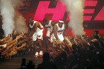 MIAMI - JULY 09:  Fans cheer as (L-R) Dwyane Wade #3, Chris Bosh #1 and LeBron James #6 of the Miami Heat are introduced during a welcome party at American Airlines Arena on July 9, 2010 in Miami, Florida.  (Photo by Marc Serota/Getty Images)