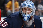 EDMONTON, CANADA - SEPTEMBER 16:  Goaltender Devan Dubnyk #40 of the Edmonton Oilers looks to make a save against the New York Islanders on September 16, 2009 at Rexall Place in Edmonton, Alberta, Canada. The Oilers won 3-2. (Photo by Dale MacMillan/Getty Images)