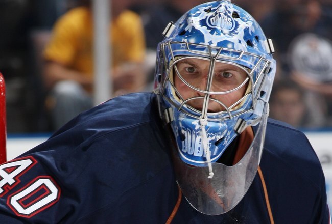 EDMONTON, CANADA - SEPTEMBER 16:  Goaltender Devan Dubnyk #40 of the Edmonton Oilers looks to make a save against the New York Islanders on September 16, 2009 at Rexall Place in Edmonton, Alberta, Canada. The Oilers won 3-2. (Photo by Dale MacMillan/Getty Images)