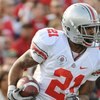 PASADENA, CA - JANUARY 01:  Anderson Russell #21 of the Ohio State Buckeyes returns a kick against the Oregon Ducks during the 96th Rose Bowl game on January 1, 2010 in Pasadena, California.  (Photo by Harry How/Getty Images)