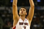 TORONTO - OCTOBER 31:  Andrea Bargnani #7 of the Toronto Raptors takes a shot against the Philadelphia 76ers at the Air Canada Centre on October 31, 2007 in Toronto, Ontario, Canada. NOTE TO USER: User expressly acknowledges and agrees that, by downloading and/or using this Photograph, user is consenting to the terms and conditions of the Getty Images License Agreement. (Photo by Dave Sandford/Getty Images)