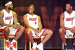 MIAMI - JULY 09:   LeBron James #6, Dwyane Wade #3 and Chris Bosh #1 of the Miami Heat speak after being introduced to fans during a welcome party at American Airlines Arena on July 9, 2010 in Miami, Florida.  (Photo by Doug Benc/Getty Images)
