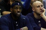 ORLANDO, FL - MAY 26:  LeBron James #23 and Zydrunas Ilgauskas #11 of the Cleveland Cavaliers look on from the bench during the game against the Orlando Magic in Game Four of the Eastern Conference Finals during the 2009 NBA Playoffs at the Amway Arena on May 26, 2009 in Orlando, Florida. NOTE TO USER: User expressly acknowledges and agrees that, by downloading and or using this photograph, User is consenting to the terms and conditions of the Getty Images License Agreement.  (Photo by Elsa/Getty Images)