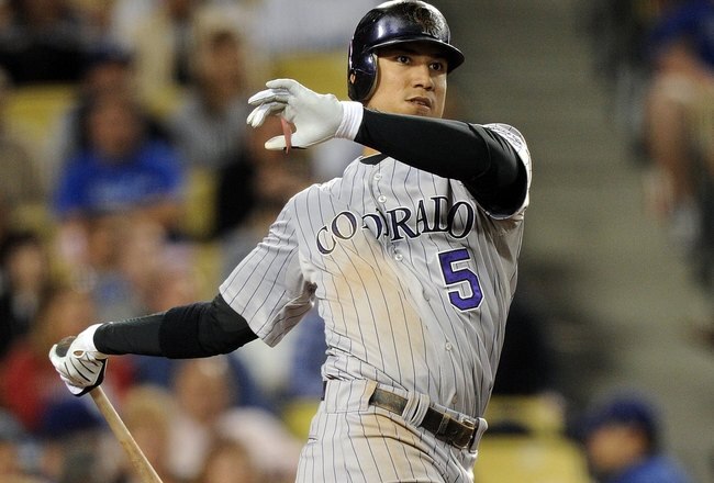 LOS ANGELES, CA - MAY 07:  Carlos Gonzalez #5 of the Colorado Rockies at bat against the Los Angeles Dodgers at Dodger Stadium on May 7, 2010 in Los Angeles, California.  (Photo by Harry How/Getty Images)