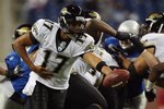 DETROIT - NOVEMBER 09: Cleo Lemon #17 of the Jacksonville Jaguars looks to handoff the ball against the Detroit Lions on November 9, 2008 at Ford Field in Detroit, Michigan. Jacksonville defeated Detroit 38-14. (Photo by Jim McIsaac/Getty Images)
