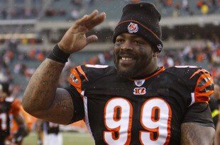 CINCINNATI - DECEMBER 27:  Tank Johnson #99 of the Cincinnati Bengals celebrates defeating the Kansas City Chiefs in their NFL game at Paul Brown Stadium December 27, 2009 in Cincinnati, Ohio.    (Photo by John Sommers II/Getty Images)