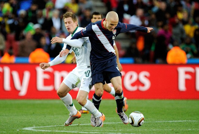 JOHANNESBURG, SOUTH AFRICA - JUNE 18:  Valter Birsa of Slovenia and Michael Bradley of the United States battle for the ball during the 2010 FIFA World Cup South Africa Group C match between Slovenia and USA at Ellis Park Stadium on June 18, 2010 in Johannesburg, South Africa.  (Photo by Kevork Djansezian/Getty Images)