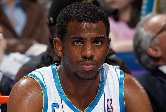 NEW ORLEANS - MARCH 22:  James Posey #41 and Chris Paul #3 of the New Orleans Hornets talk on the bench during the game against the Dallas Mavericks at the New Orleans Arena on March 22, 2010 in New Orleans, Louisiana.  NOTE TO USER: User expressly acknowledges and agrees that, by downloading and/or using this Photograph, User is consenting to the terms and conditions of the Getty Images License Agreement.  (Photo by Chris Graythen/Getty Images)