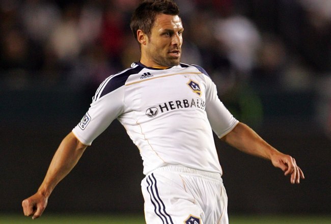 CARSON, CA - MARCH 27:  Dema Kovalenko #8 of the Los Angeles Galaxy passes the ball on the attack in the second half during their MLS match against the New England Revolution at the Home Depot Center on March 27, 2010 in Carson, California. The Galaxy defeated the Revolution 1-0.  (Photo by Victor Decolongon/Getty Images)
