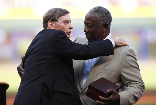 CINCINNATI, OH - JUNE 20: Major League Baseball Commissioner Allan 'Bud' Selig (L) embraces baseball Hall of Famer Hank Aaron after presenting him the MLB Beacon Award prior to the Gillette Civil Right Game between the Cincinnati Reds and Chicago White Sox at Great American Ball Park on June 20, 2009 in Cincinnati, Ohio. (Photo by Joe Robbins/Getty Images)