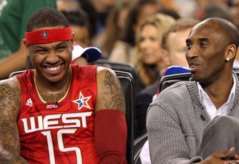 ARLINGTON, TX - FEBRUARY 14: (L-R) Carmelo Anthony #15 and Kobe Bryant #24 of the Western Conference share a laugh during the NBA All-Star Game, part of 2010 NBA All-Star Weekend at Cowboys Stadium on February 14, 2010 in Arlington, Texas. The Eastern Conference defeated the Western Conference 141-139 in regulation. NOTE TO USER: User expressly acknowledges and agrees that, by downloading and or using this photograph, User is consenting to the terms and conditions of the Getty Images License Agreement. (Photo by Jed Jacobsohn/Getty Images)