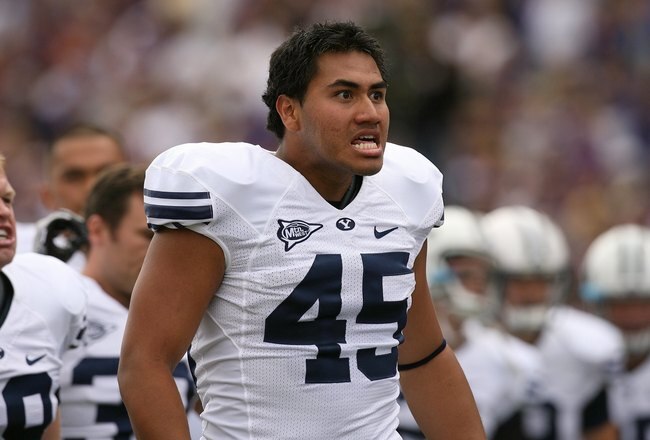SEATTLE - SEPTEMBER 6:  Harvey Unga #45 of the BYU Cougars looks on from the sideline during their game against the Washington Huskies on September 6, 2008 at Husky Stadium in Seattle, Washington. The Cougars defeated the Huskies 28-27. (Photo by Otto Greule Jr/Getty Images)