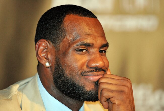 MIAMI - JULY 09:  LeBron James #6, of the Miami Heat smiles during a press conference after a welcome party at American Airlines Arena on July 9, 2010 in Miami, Florida.  (Photo by Doug Benc/Getty Images)