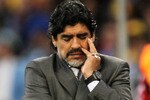 CAPE TOWN, SOUTH AFRICA - JULY 03:  Diego Maradona head coach of Argentina shows his dejection as he suffers a massive defeat in the 2010 FIFA World Cup South Africa Quarter Final match between Argentina and Germany at Green Point Stadium on July 3, 2010 in Cape Town, South Africa.  (Photo by Chris McGrath/Getty Images)