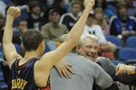 MINNEAPOLIS, MN - APRIL 7: Head coach Don Nelson (C) of Golden State Warriors celebrates with his fellow coaches and players following a basketball game against the Minnesota Timberwolves at Target Center on April 7, 2010 in Minneapolis, Minnesota. The Warriors defeated the Timberwolves 116-107. NOTE TO USER: User expressly acknowledges and agrees that, by downloading and or using this Photograph, user is consenting to the terms and conditions of the Getty Images License Agreement.  (Photo by Hannah Foslien /Getty Images)