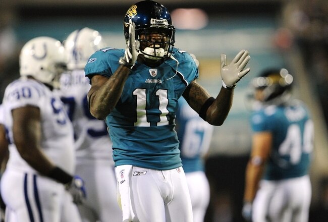 JACKSONVILLE, FL - DECEMBER 17:  Mike Sims-Walker #11 of the Jacksonville Jaguarsreacts after he made a reception in the first half against the Indianapolis Colts at Jacksonville Municipal Stadium on December 17, 2009 in Jacksonville, Florida.  (Photo by Sam Greenwood/Getty Images)