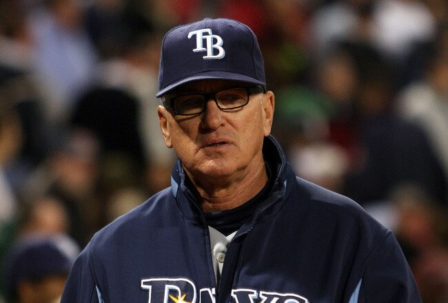 BOSTON - OCTOBER 14:  Manager Joe Madden of the Tampa Bay Rays looks on as his team takes on the Boston Red Sox in game four of the American League Championship Series during the 2008 MLB playoffs at Fenway Park on October 14, 2008 in Boston, Massachusetts.  (Photo by Elsa/Getty Images)