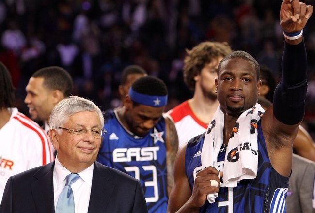 ARLINGTON, TX - FEBRUARY 14:  NBA Commissioner David Stern looks on while Dwayne Wade #3 of the Eastern Conference celebrates after being named the MVP of the NBA All-Star Game, part of 2010 NBA All-Star Weekend at Cowboys Stadium on February 14, 2010 in Arlington, Texas. The Eastern Conference defeated the Western Conference 141-139 in regulation.  NOTE TO USER: User expressly acknowledges and agrees that, by downloading and or using this photograph, User is consenting to the terms and conditions of the Getty Images License Agreement.  (Photo by Ronald Martinez/Getty Images)