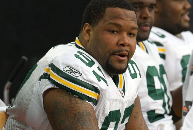 GLENDALE, AZ - JANUARY 03:  Johnny Jolly #97 of the Green Bay Packers looks on from the bench against the Arizona Cardinals at University of Phoenix Stadium on January 3, 2010 in Glendale, Arizona.  (Photo by Maxx Wolfson/Getty Images)
