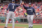 CINCINNATI - MAY 18:  Prince Fielder #28 of the Milwaukee Brewers is congratulated by Corey Hart #1 after Fielder scored in the first inning during the game against the Cincinnati Reds at Great American Ball Park on May 18, 2010 in Cincinnati, Ohio.  (Photo by Andy Lyons/Getty Images)