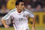 OAKLAND, CA - MARCH 28:  Omar Bravo #19 of Mexico runs upfield during the game against Ecuador at McAfee Stadium on March 28, 2007 in Oakland, California.  (Photo by Lisa Blumenfeld/Getty Images for VISA)