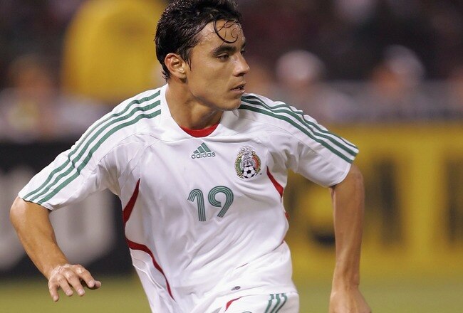 OAKLAND, CA - MARCH 28:  Omar Bravo #19 of Mexico runs upfield during the game against Ecuador at McAfee Stadium on March 28, 2007 in Oakland, California.  (Photo by Lisa Blumenfeld/Getty Images for VISA)