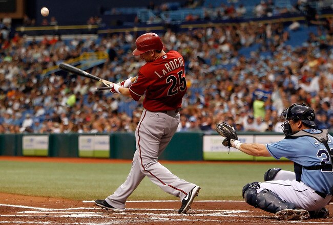 ST. PETERSBURG - JUNE 27:  Adam LaRoche #25 of the Arizona Diamondbacks breaks his bat against the Tampa Bay Rays during the game at Tropicana Field on June 27, 2010 in St. Petersburg, Florida.  (Photo by J. Meric/Getty Images)