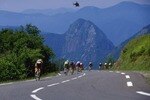 20 Jul 1999:  The peloton rides against the back-drop of the Pyrenees as a lone helicopter flies overhead during stage fifteen from St Gaudens to Piau-Engaly during the 1999 Tour De France.  Mandatory Credit: Doug Pensinger /Allsport