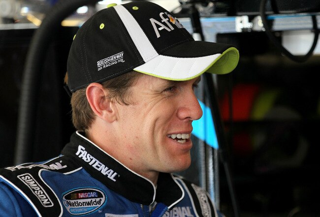 JOLIET, IL - JULY 09:  Carl Edwards, driver of the #99 Aflac Silver Ford, looks on in the garage during practice for the NASCAR Sprint Cup Series LIFELOCK.COM 400 at the Chicagoland Speedway on July 9, 2010 in Joliet, Illinois.  (Photo by Andy Lyons/Getty Images)