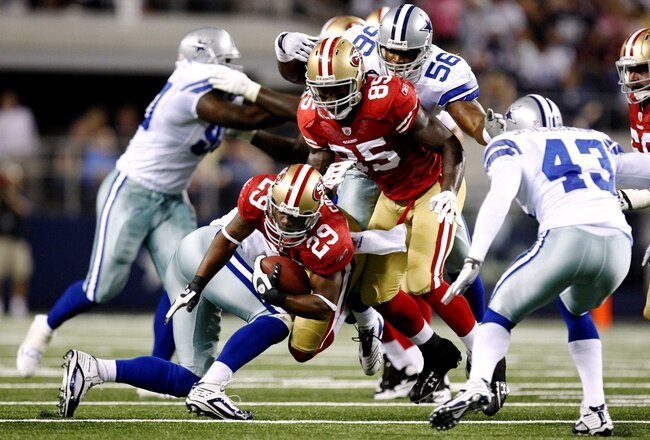 DALLAS - AUGUST 29:  Glenn Coffee #29 of the San Francisco 49ers moves forward with the ball during the preseason game against the Dallas Cowboys at Cowboys Stadium on August 29, 2009 in Dallas, Texas.  (Photo by Ronald Martinez/Getty Images)