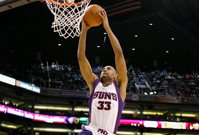 PHOENIX - NOVEMBER 25:  Grant Hill #33 of the Phoenix Suns slam dunks the ball against the Memphis Grizzlies during the NBA game at US Airways Center on November 25, 2009 in Phoenix, Arizona. NOTE TO USER: User expressly acknowledges and agrees that, by downloading and or using this photograph, User is consenting to the terms and conditions of the Getty Images License Agreement.  (Photo by Christian Petersen/Getty Images)