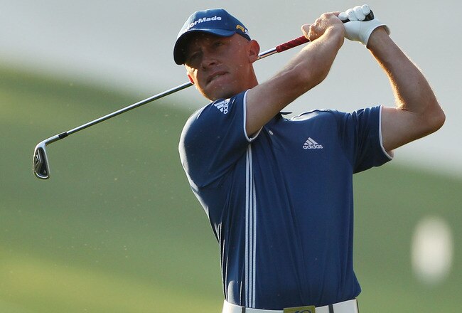 AUGUSTA, GA - APRIL 08:  Nathan Green of Australia hits his approach shot on the first hole during the first round of the 2010 Masters Tournament at Augusta National Golf Club on April 8, 2010 in Augusta, Georgia.  (Photo by Andrew Redington/Getty Images)