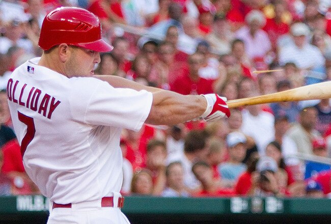 ST. LOUIS - JULY 15: Matt Holliday #7 of the St. Louis Cardinals collects a hit against the Los Angeles Dodgers at Busch Stadium on July 15, 2010 in St. Louis, Missouri.  The Cardinals beat the Dodgers 7-1.  (Photo by Dilip Vishwanat/Getty Images)