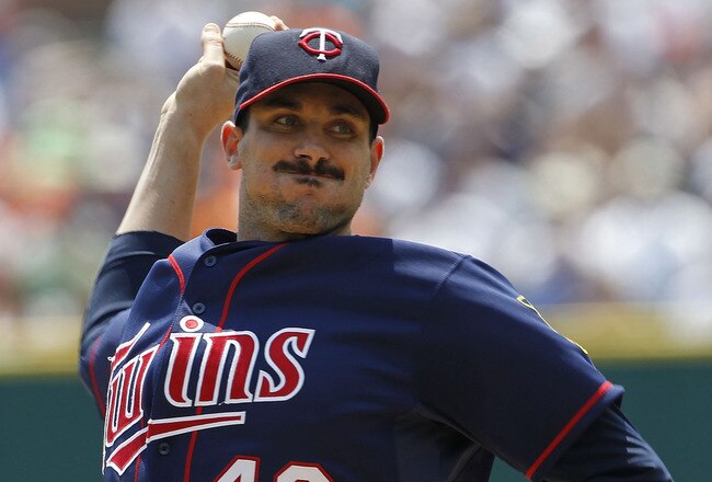 DETROIT - JULY 11: Carl Pavano #48 of the Minnesota Twins pitches in the first inning during the game against the Detroit Tigers on July 11, 2010 at Comerica Park in Detroit, Michigan.  (Photo by Leon Halip/Getty Images)