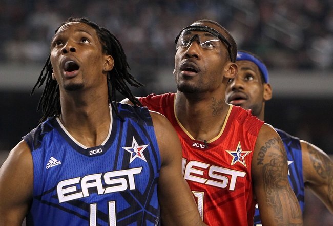 ARLINGTON, TX - FEBRUARY 14:  Chris Bosh #4 and LeBron James #23 of the Eastern Conference look on alongside Amar'e Stoudemire #1 of the Western Conference during the NBA All-Star Game, part of 2010 NBA All-Star Weekend at Cowboys Stadium on February 14, 2010 in Arlington, Texas. The Eastern Conference defeated the Western Conference 141-139 in regulation. NOTE TO USER: User expressly acknowledges and agrees that, by downloading and or using this photograph, User is consenting to the terms and conditions of the Getty Images License Agreement.  (Photo by Jed Jacobsohn/Getty Images)