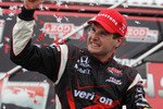 TORONTO, ON - JULY 18:  Will Power of Australia, driver of the #12 Verizon Team Penske Dallara Honda, celebrates after winning the IZOD IndyCar Series Honda Indy Toronto on July 18, 2010 in the streets of Toronto, Canada.  (Photo by Streeter Lecka/Getty Images)