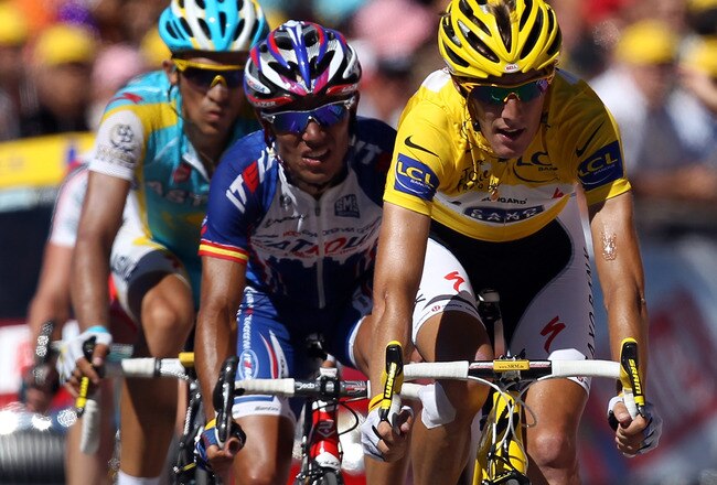 AX 3 DOMAINES, FRANCE - JULY 18:  Race leader Andy Schleck of Luxembourg and Team Saxo Bank leads Joaquin Rodriguez of Spain and Team Katusha and Alberto Contador of Spain and the Astana Team over the finish line during stage fourteen of the 2010 Tour de France from Revel to Ax 3 Domaines on July 18, 2010 in Ax 3 Domaines, France.  (Photo by Bryn Lennon/Getty Images)