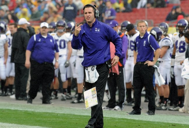 TAMPA, FL - JANUARY 1: Coach Pat Fitzgerald of the Northwestern Wildcats directs play against the Auburn Tigers in the Outback Bowl January 1, 2010 at Raymond James Stadium in Tampa, Florida.  (Photo by Al Messerschmidt/Getty Images)