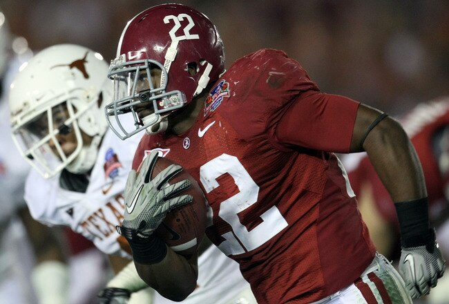 PASADENA, CA - JANUARY 07:  Running back Mark Ingram #22 of the Alabama Crimson Tide runs with the ball against the Texas Longhorns during the Citi BCS National Championship game at the Rose Bowl on January 7, 2010 in Pasadena, California.  (Photo by Stephen Dunn/Getty Images)
