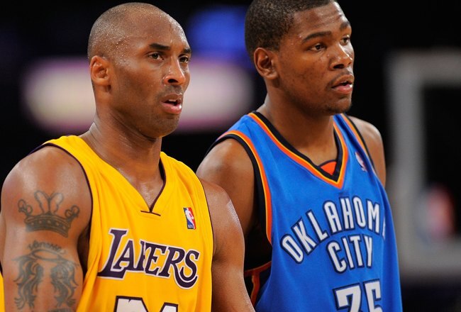 LOS ANGELES, CA - APRIL 27:  Kobe Bryant #24 of the Los Angeles Lakers stands next to Kevin Durant #35 of the Oklahoma City Thunder during Game Two of the Western Conference Quarterfinals of the 2010 NBA Playoffs at Staples Center on April 27, 2010 in Los Angeles, California.  (Photo by Kevork Djansezian/Getty Images)
