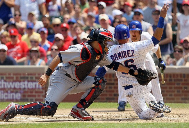 CHICAGO, IL - MAY 30:  Yadier Molina #4 of the St. Louis Cardinals tags out Aramis Ramirez #16 of the Chicago Cubs for the final out of the second inning on May 30, 2010 at Wrigley Field in Chicago, Illinois.  (Photo by Jim McIsaac/Getty Images)