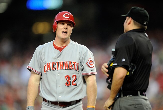 WASHINGTON - JUNE 04: Jay Bruce #32 of the Cincinnati Reds argues with home plate umpire Dan Bellino after being called out on strikes during the game against the Washington Nationals at Nationals Park on June 4, 2010 in Washington, DC.  (Photo by Greg Fiume/Getty Images)