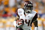 ATLANTA - DECEMBER 31:  Running back Ryan Williams #34 of the Virginia Tech Hokies runs with the ball during the Chick-Fil-A Bowl against the Tennessee Volunteers at the Georgia Dome on December 31, 2009 in Atlanta, Georgia.  The Hokies beat the Volunteers 37-14.  (Photo by Mike Zarrilli/Getty Images)