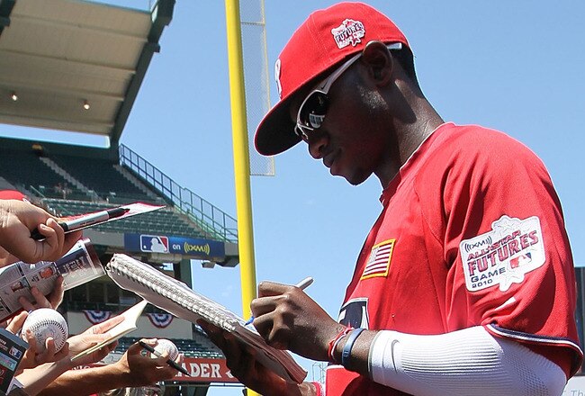 ANAHEIM, CA - JULY 11:  U.S. Futures All-Star Domonic Brown #3 of the Philadelphia Phillies signs autographs before the 2010 XM All-Star Futures Game at Angel Stadium of Anaheim on July 11, 2010 in Anaheim, California.  (Photo by Stephen Dunn/Getty Images)